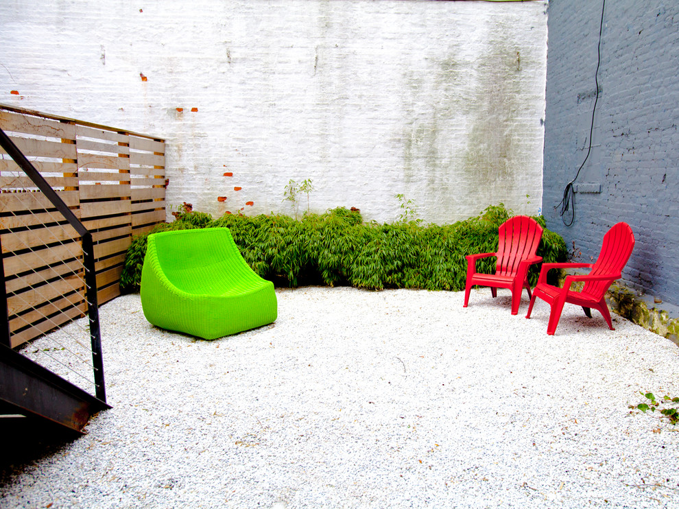 Inspiration for an eclectic patio in New York with gravel.
