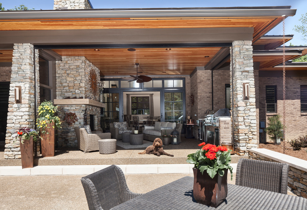 Inspiration for a transitional patio remodel in Cincinnati with a fire pit