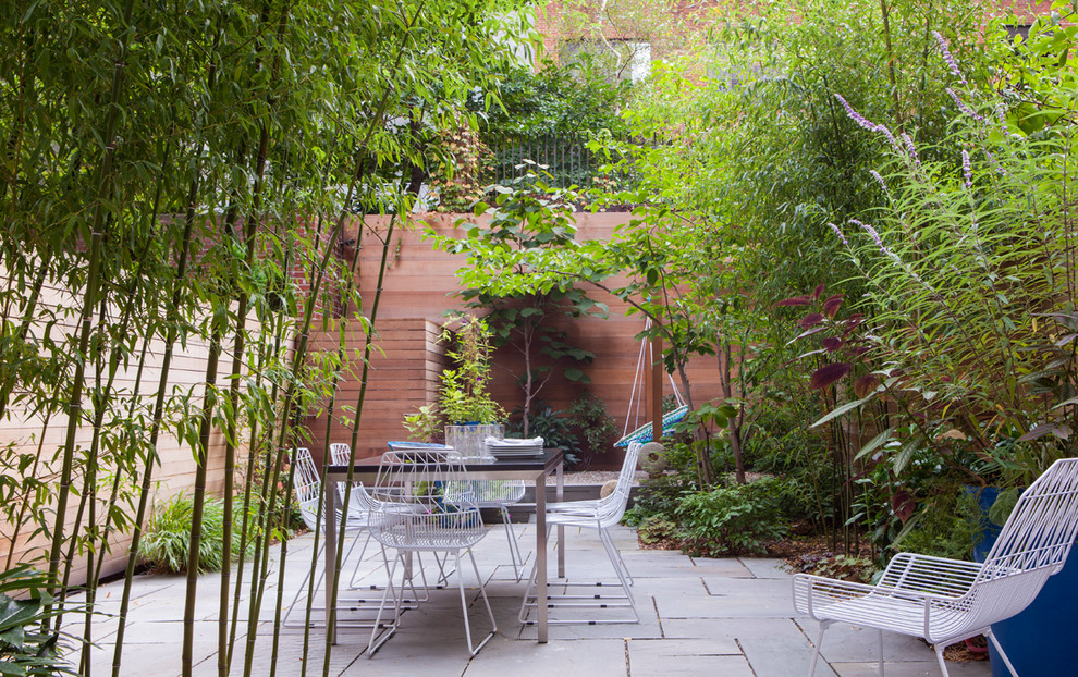 Photo of a contemporary patio in New York with no cover.