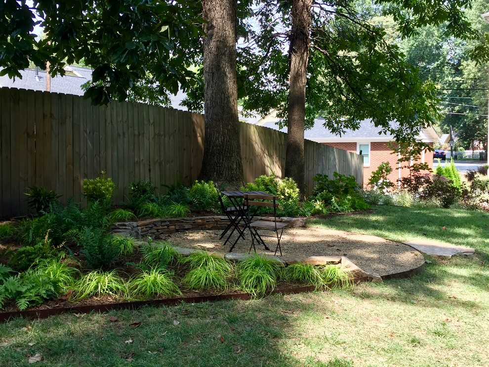 Example of a transitional patio design in Charlotte