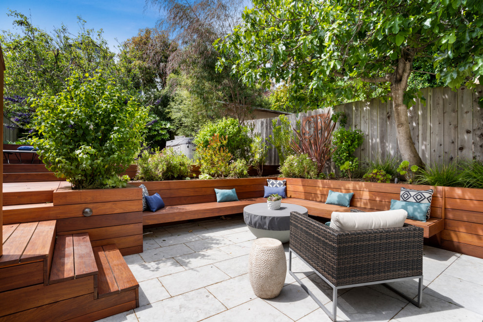 Contemporary patio in San Francisco with a fire feature and no cover.