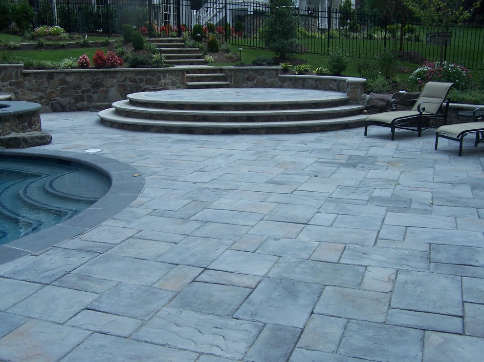 Photo of a medium sized bohemian back patio in DC Metro with concrete paving.