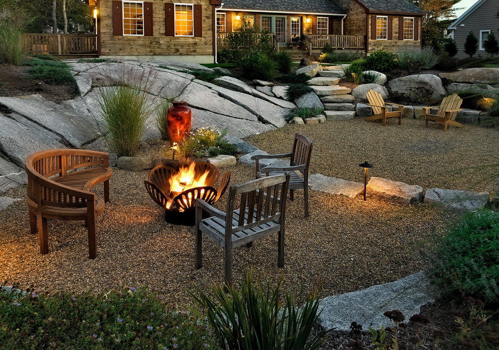 Rustic patio in Portland Maine with a fire feature.