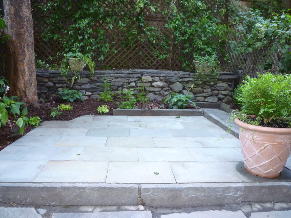 Patio container garden - small traditional backyard stone patio container garden idea in New York with no cover