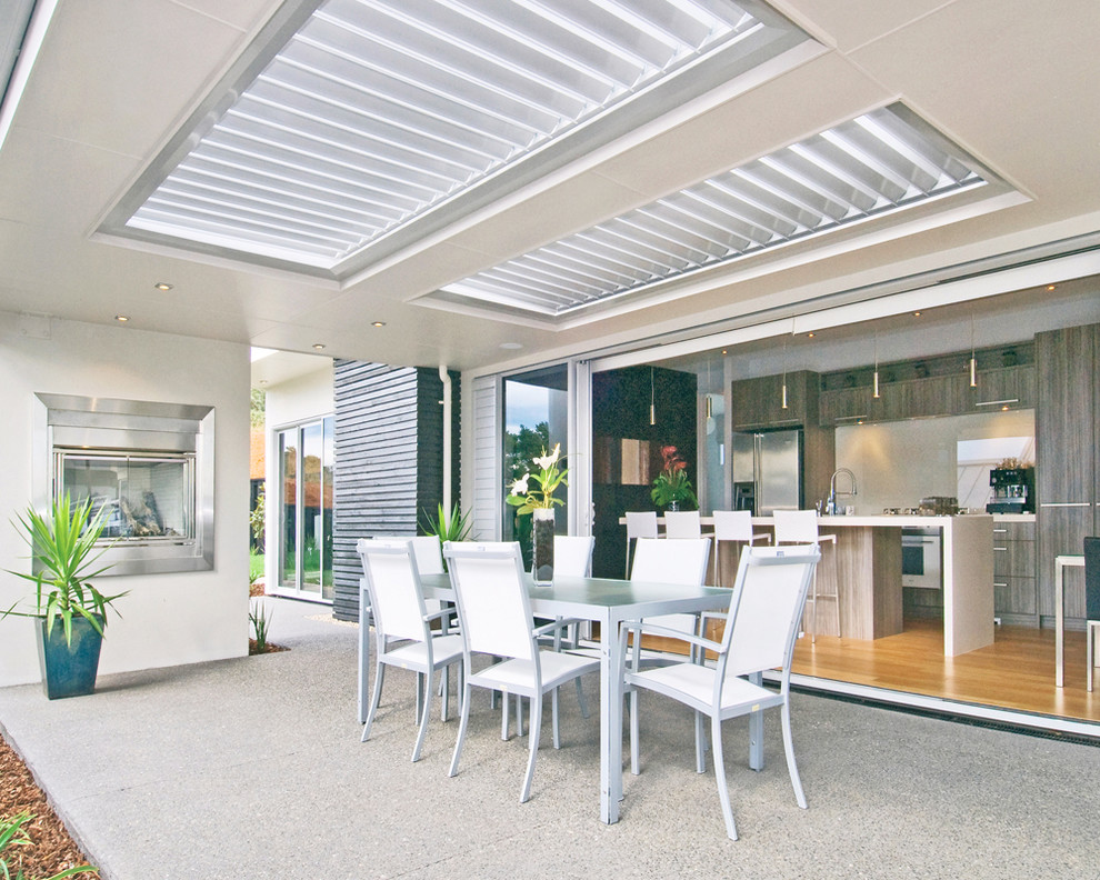 This is an example of a contemporary back patio in Sydney.
