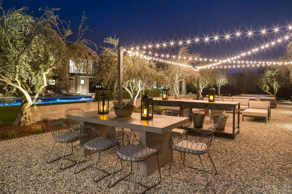 Huge farmhouse backyard gravel patio photo in San Francisco with no cover