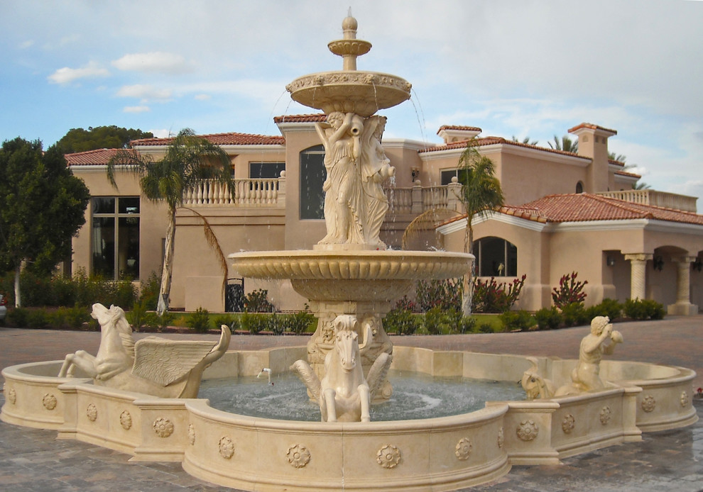Mid-sized tuscan front yard stone patio fountain photo in Phoenix with no cover