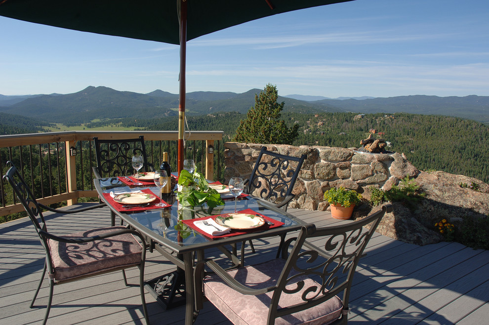 Inspiration for a timeless patio remodel in Denver with decking