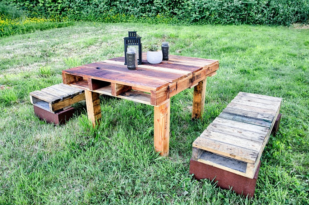 Inspiration for a rustic patio remodel in Seattle with no cover