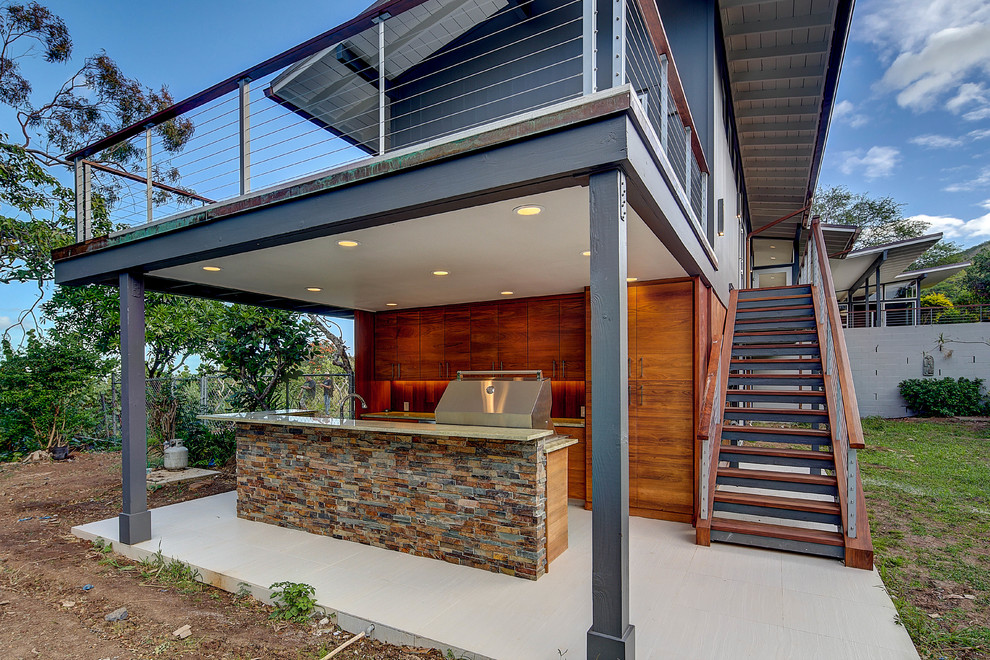 Idées déco pour une terrasse arrière contemporaine de taille moyenne avec une cuisine d'été, une dalle de béton et une extension de toiture.
