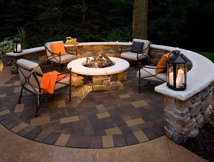 Inspiration for a mid-sized timeless backyard concrete paver patio remodel in Phoenix with a fire pit and no cover