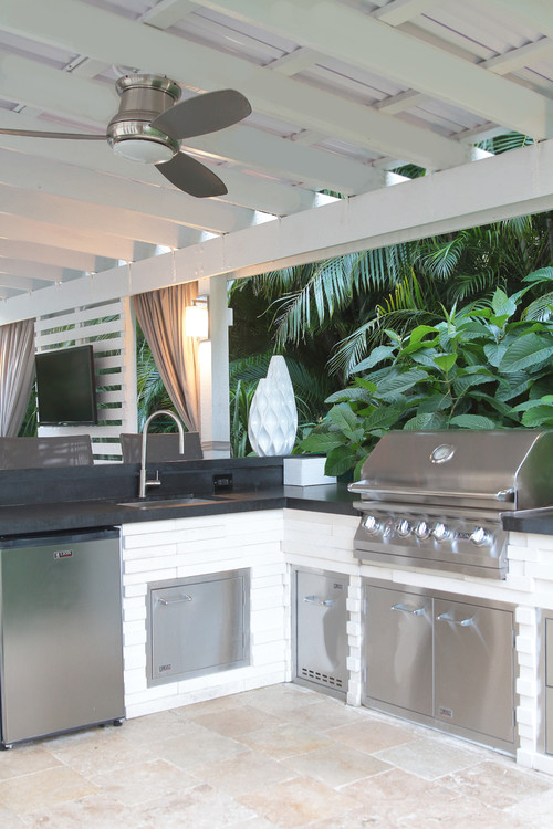 Outdoor Kitchen Cabinet Ideas: Black Granite Countertop on a White Brick Kitchen Deck