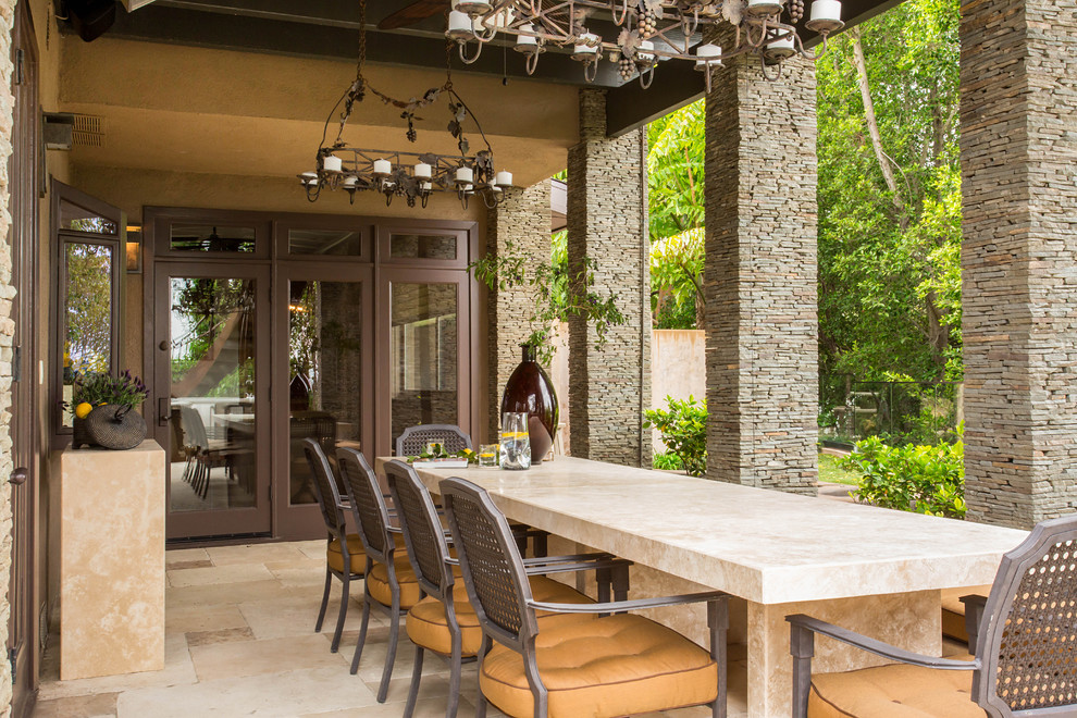 Patio - huge mediterranean backyard tile patio idea in Los Angeles