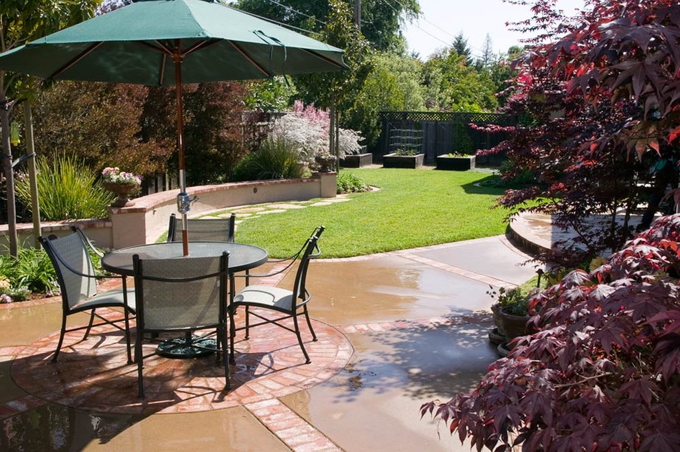 Design ideas for a medium sized classic back patio in San Francisco with a vegetable patch, brick paving and no cover.