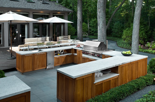 White Granite Countertops Accentuate Wood Outdoor Kitchen Cabinets