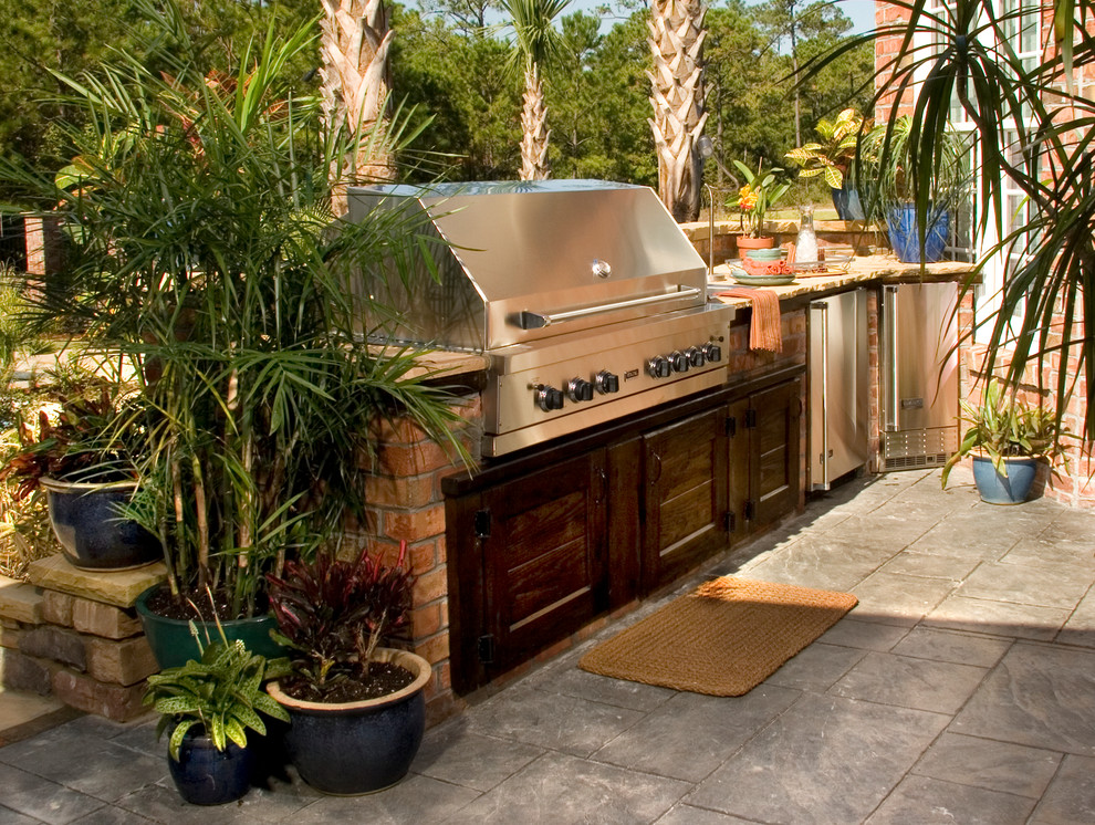 Design ideas for a world-inspired patio in Wilmington with an outdoor kitchen and no cover.