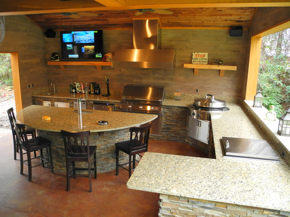 Outdoor kitchen with Solaire Grill, Evo Cooktop, kegerator and more