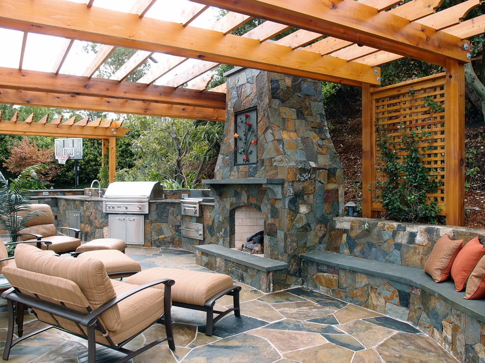 Inspiration for a mediterranean patio remodel in San Francisco with a pergola