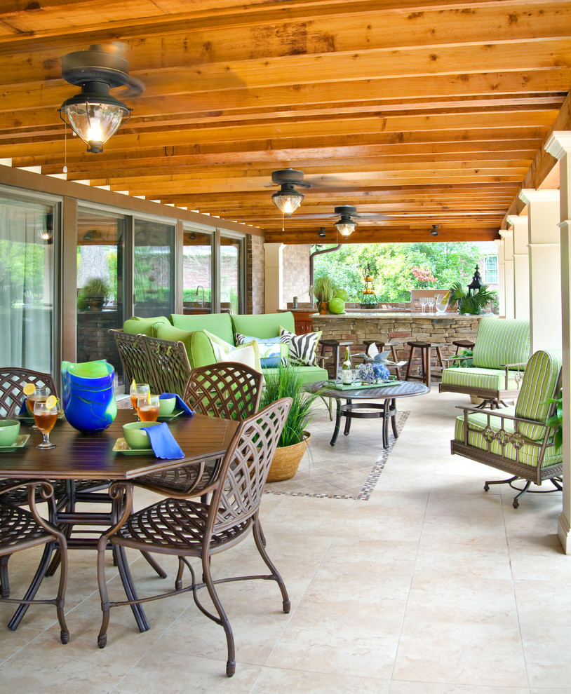 Patio - traditional patio idea in Charleston with a roof extension