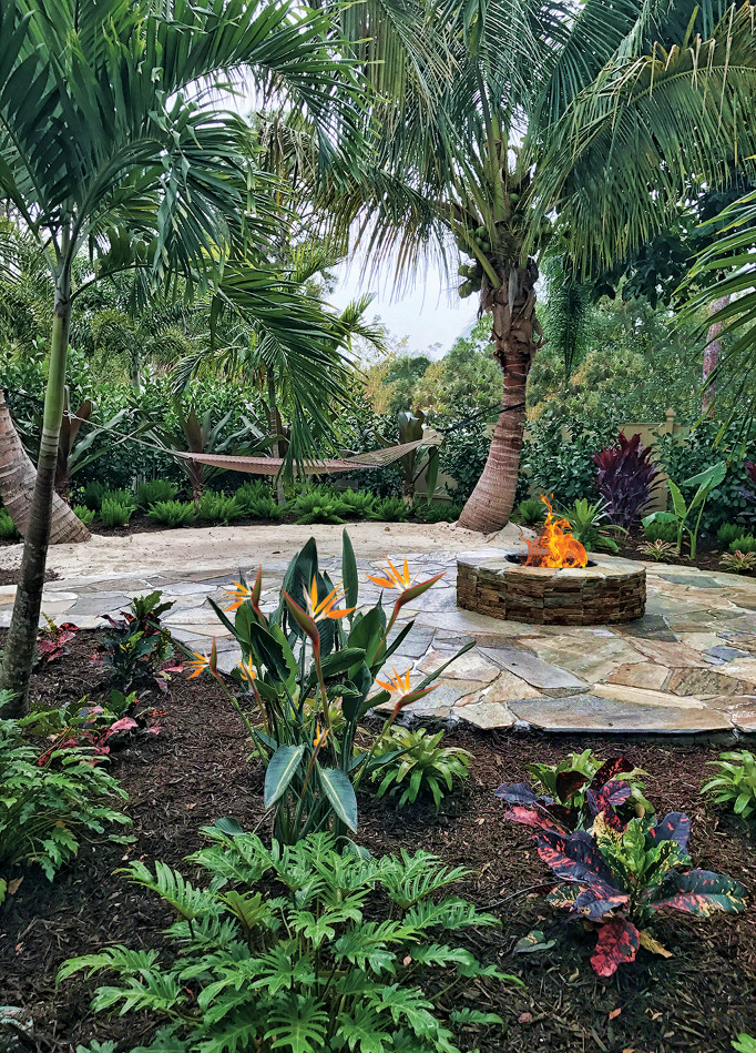 Outdoor Living Tropical Patio Miami by Evergreen Irrigation