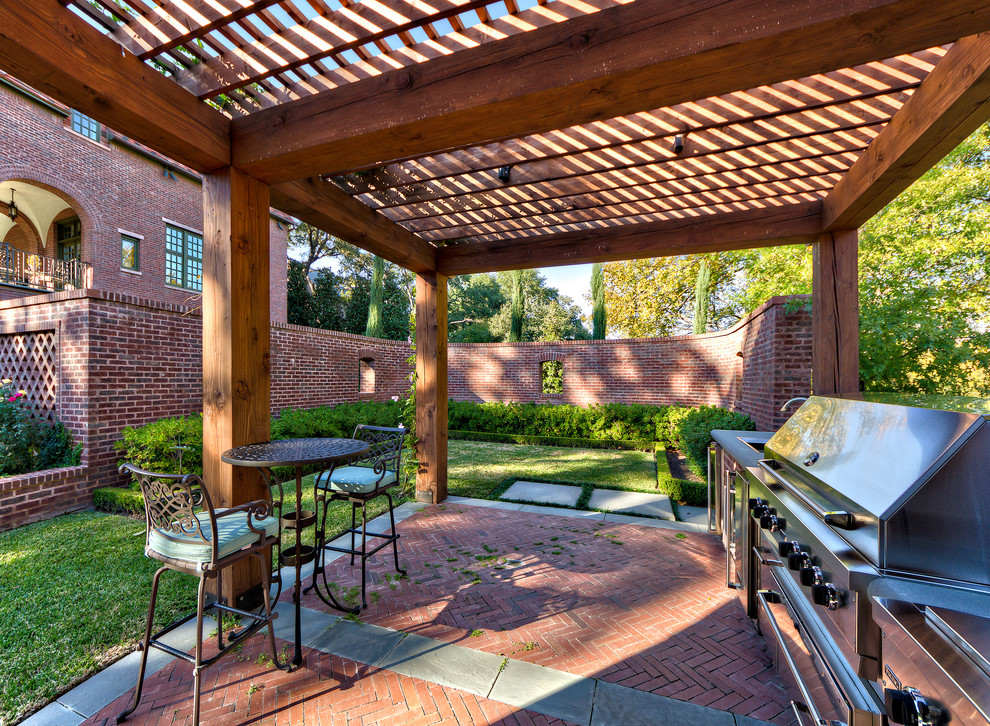 Inspiration for a traditional patio in Dallas with a pergola and a bbq area.