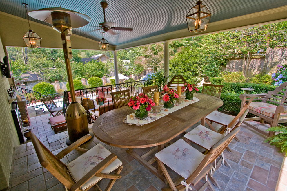 Inspiration for a traditional patio in Little Rock with a roof extension.