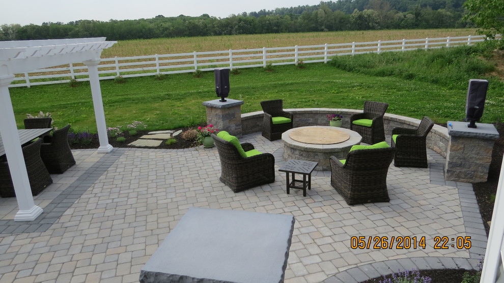 Design ideas for a classic patio in Other with concrete paving.