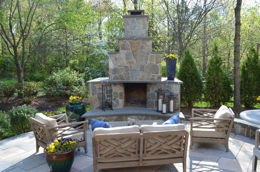 Photo of a traditional patio in Other with a fire feature.