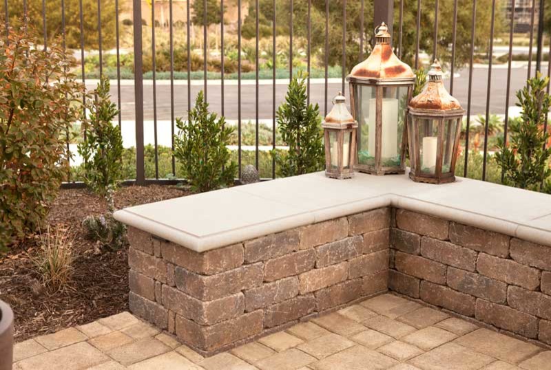 Patio container garden - small rustic backyard stone patio container garden idea in Orange County with no cover