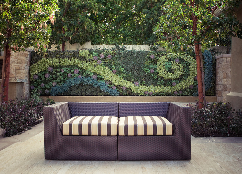 Inspiration for a contemporary courtyard patio vertical garden remodel in Los Angeles