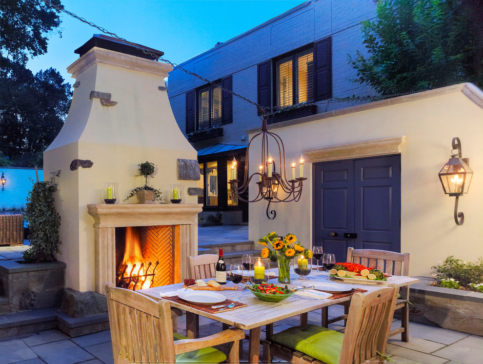 Patio - mediterranean patio idea in DC Metro with a fire pit