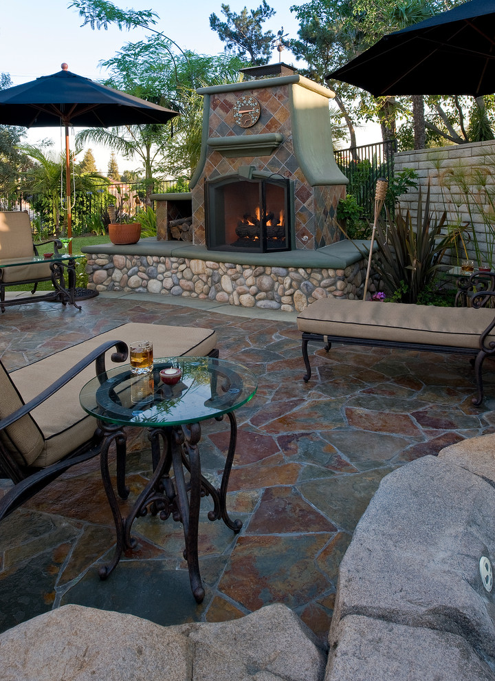 Outdoor Paradise Tropical Patio Orange County by Steven Paul