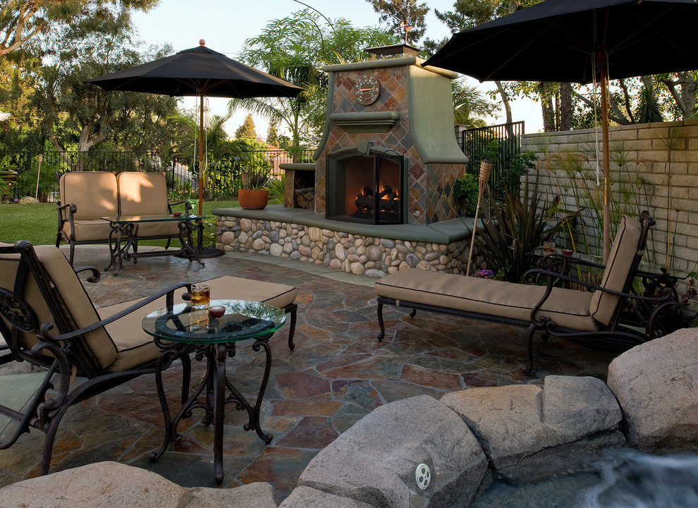 Patio - tropical patio idea in Orange County