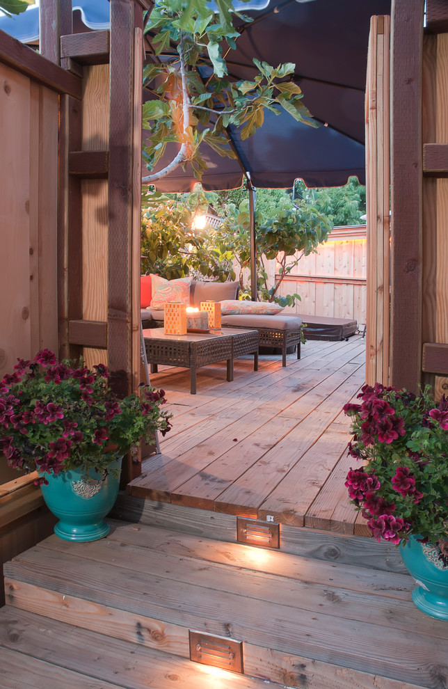 Inspiration for a medium sized traditional side patio in San Diego with decking.