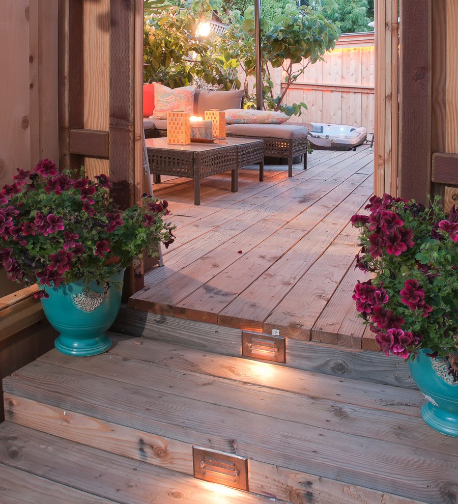 Inspiration for a medium sized classic side patio in San Diego with decking.