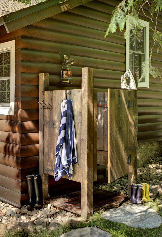 Inspiration for a rustic outdoor patio shower remodel in Minneapolis