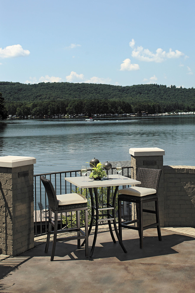 Outdoor wicker bar stools and two top table Traditional Patio