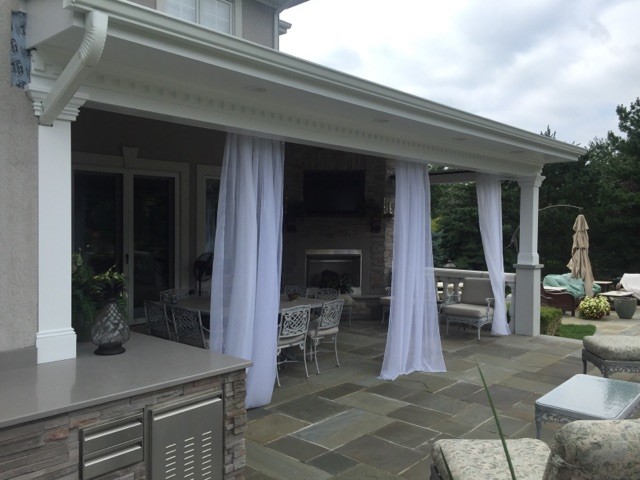 Example of a cottage chic patio design in Newark
