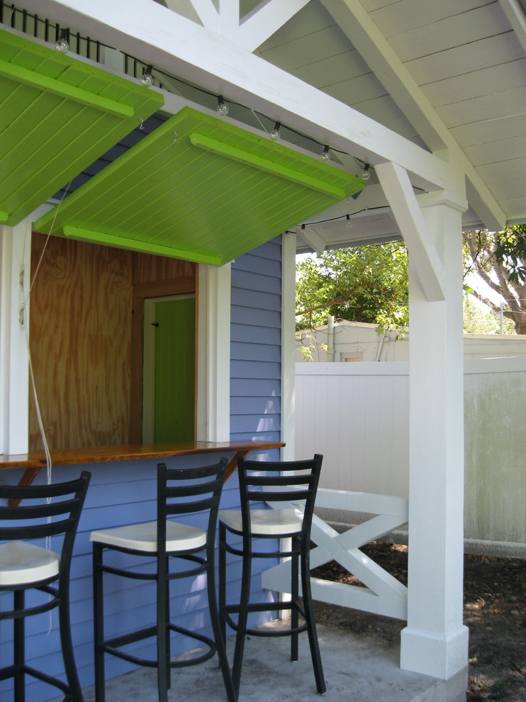 Photo of a medium sized world-inspired back patio in Tampa.