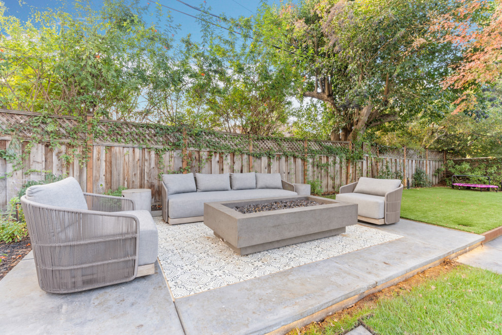 Inspiration for a large contemporary backyard concrete paver patio remodel in San Francisco with no cover