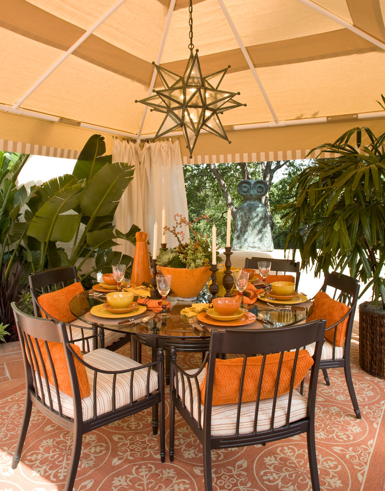 This is an example of a mediterranean patio in Los Angeles with a gazebo.