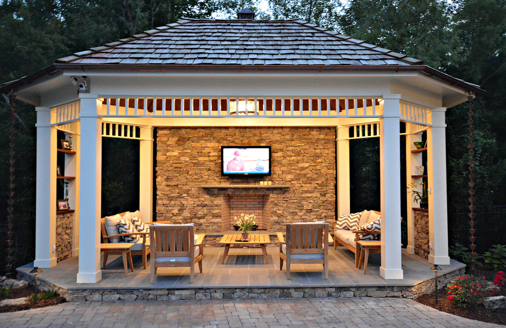 Example of a classic patio design in Raleigh