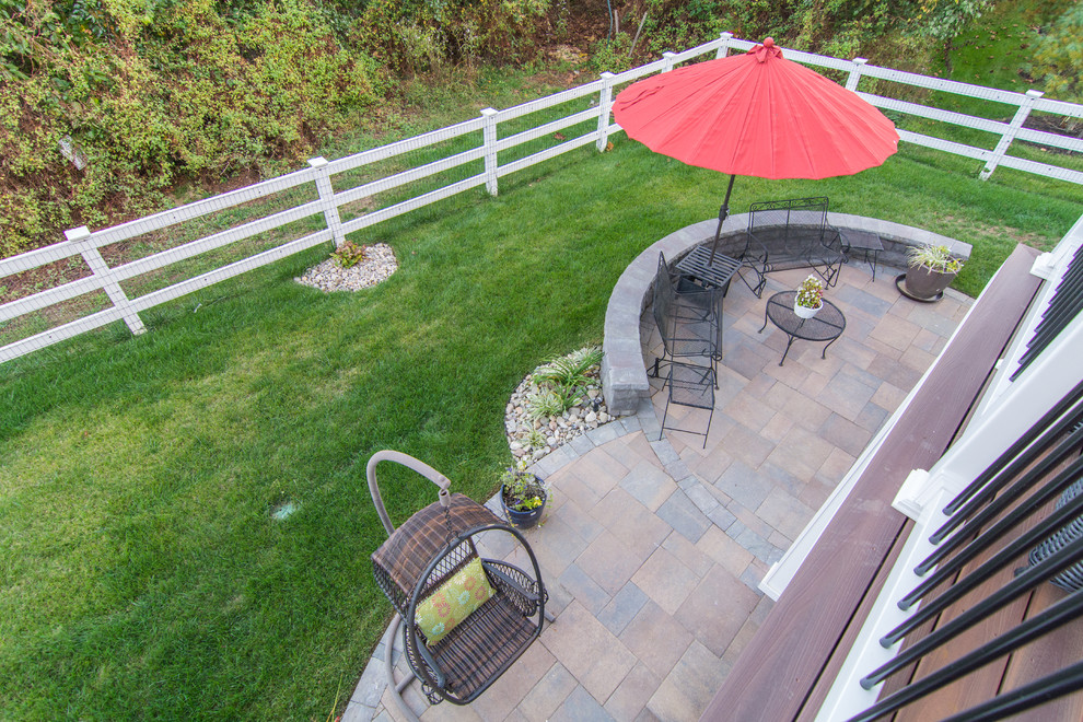 Patio - large transitional backyard concrete paver patio idea in DC Metro with no cover