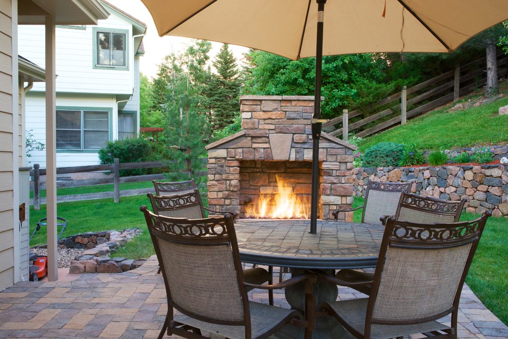 Patio and Fire place Rustic Patio Denver by Kona Contractors