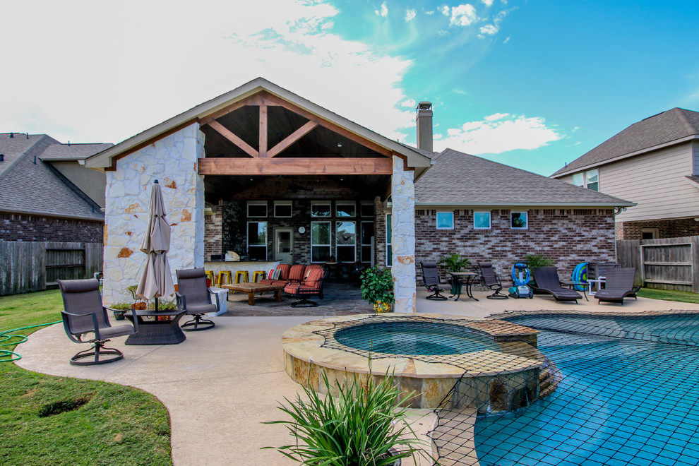 Patio Cover, Kitchen, and Fireplace Katy, TX Traditional Patio