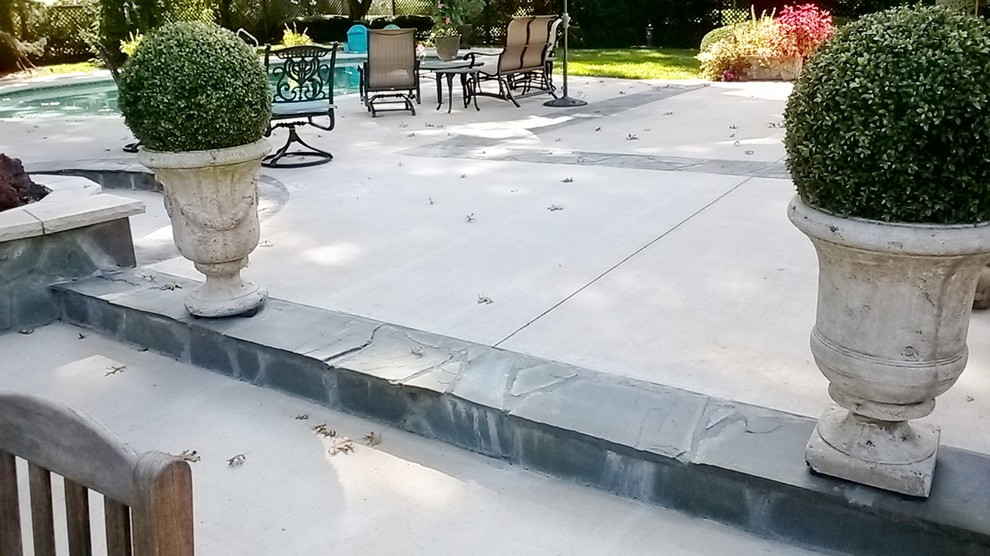 Design ideas for a large contemporary patio in Kansas City.
