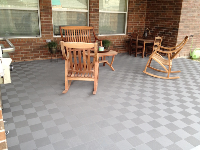 Inspiration for a mid-sized timeless tile patio remodel in Houston