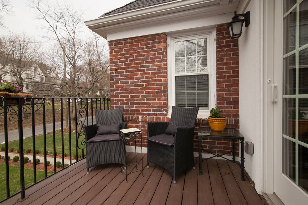 Photo of a medium sized classic patio in New York with decking and no cover.