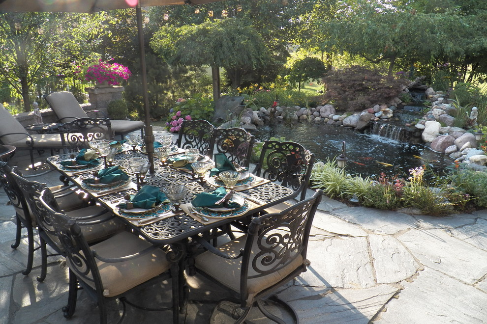Example of a tuscan patio design in Chicago