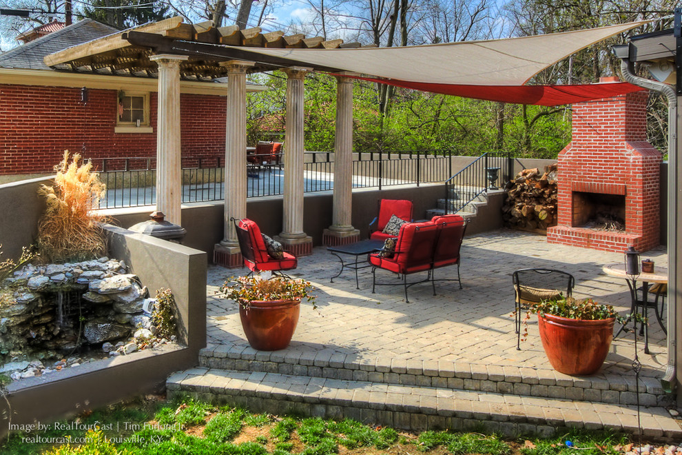Paver Patio with Fire pit, Fountain, Pergola, and Custom Fabric Shade